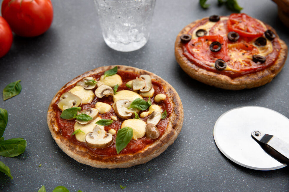 Loaded Vegan Pita Pizzas With Oil-Free Cheese - Simply Plant Based Kitchen